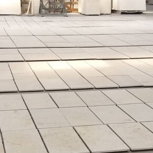 Cream white marble floor tiles with plain and floral pattern, natural stone flooring Thailand
