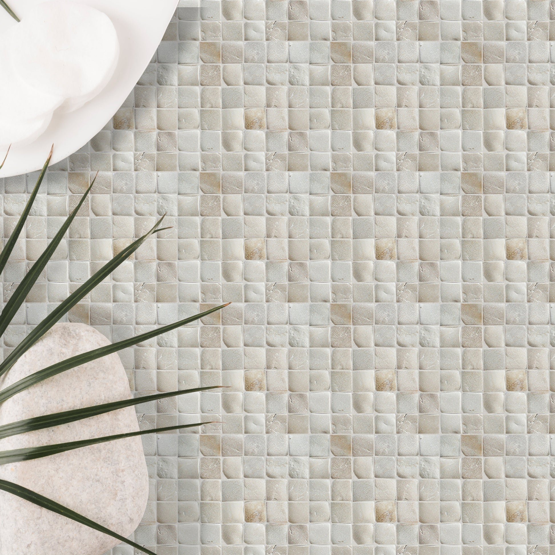 Close-up of a square pebble mosaic tile.