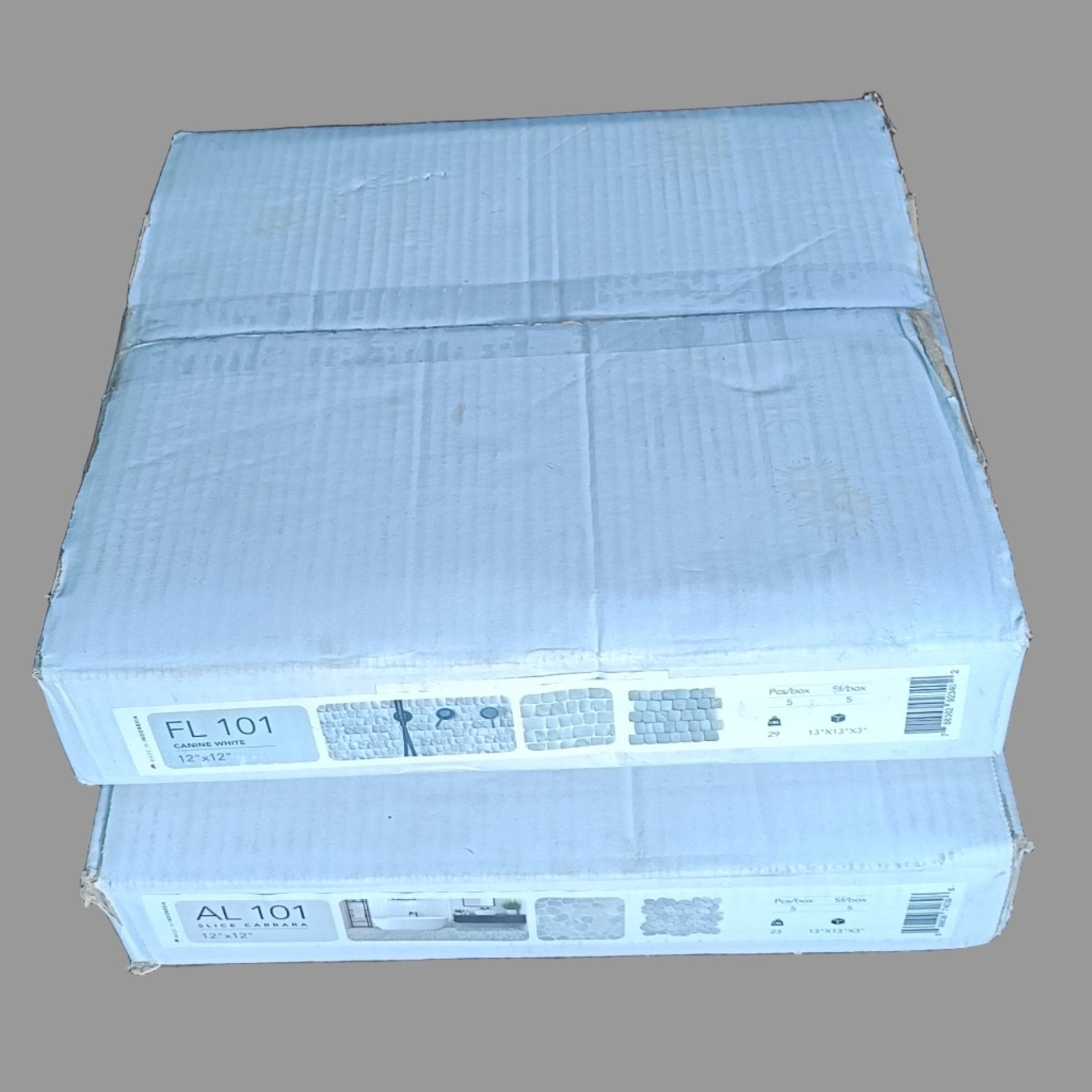 Two Pebble Tile Packing Boxes.